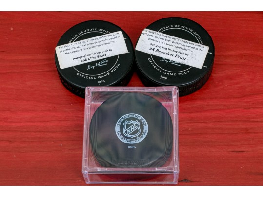 Three Autographed New York Rangers NHL Pucks 