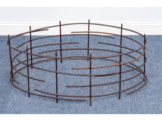 A Beautiful Oval Iron And Thick Glass Cocktail Table