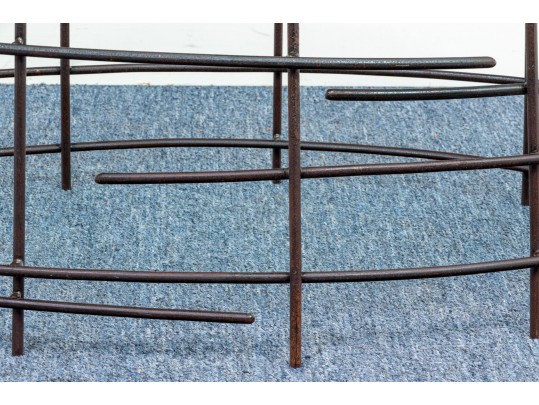 A Beautiful Oval Iron And Thick Glass Cocktail Table