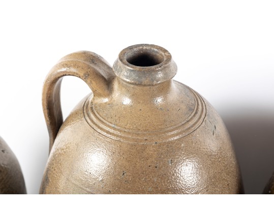 Four Antique North Carolina Glazed Stoneware Jugs