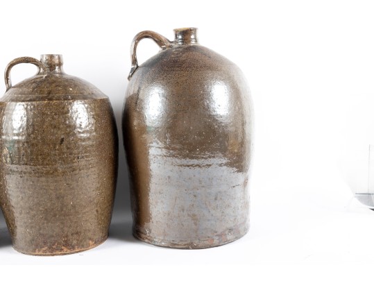 Four Antique North Carolina Glazed Stoneware Jugs