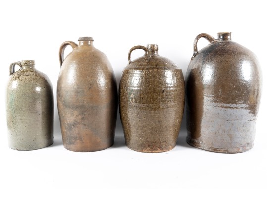 Four Antique North Carolina Glazed Stoneware Jugs