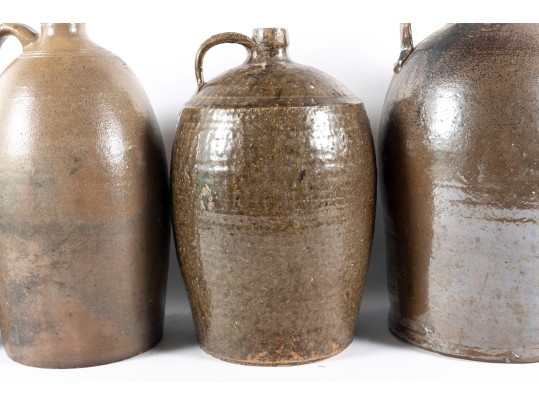 Four Antique North Carolina Glazed Stoneware Jugs