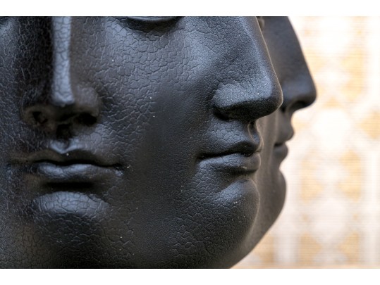 Perpetual Faces Decorative Vessel