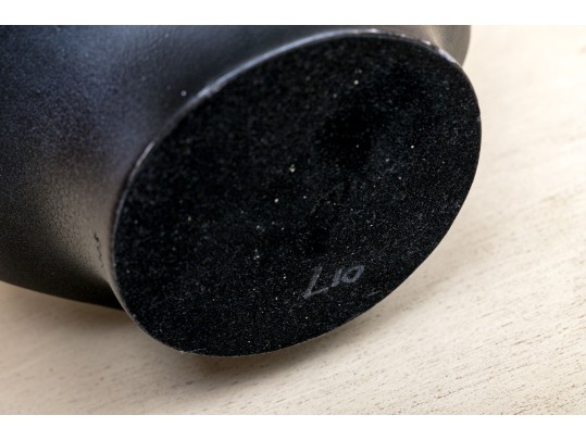 Perpetual Faces Decorative Vessel