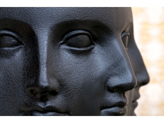 Perpetual Faces Decorative Vessel