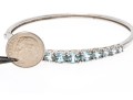 Sterling Silver Lovely Graduated Pale Blue Topaz Bangle Bracelet And Compatible Earrings