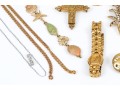 Lot Of Assorted Costume Jewelry Pieces, Including A Trifari Brooch