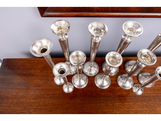 Eleven Weighted Sterling Candlesticks