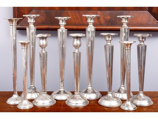 Eleven Weighted Sterling Candlesticks