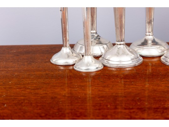 Eleven Weighted Sterling Candlesticks
