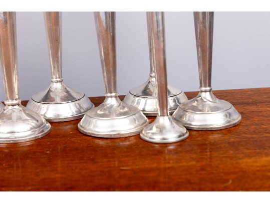 Eleven Weighted Sterling Candlesticks