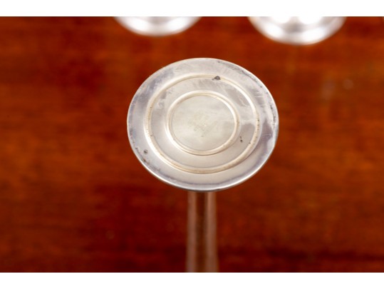 Eleven Weighted Sterling Candlesticks