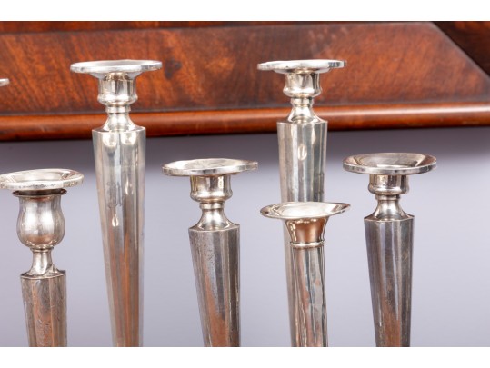 Eleven Weighted Sterling Candlesticks