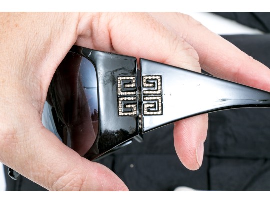 Group Of Assorted Fashion Items, Including Sunglasses, Makeup Bag, And A Quilted Handbag