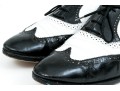 Salvatore Ferragamo Classic Black And White Leather Wing Tip Saddle Shoes, Size 36 1/2