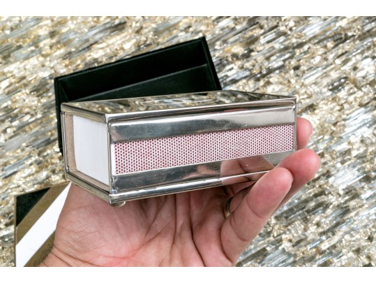 Two Decorative Table Top Items, Including A Striped Lidded Box, And Matchstrike 