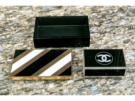 Two Decorative Table Top Items, Including A Striped Lidded Box, And Matchstrike 