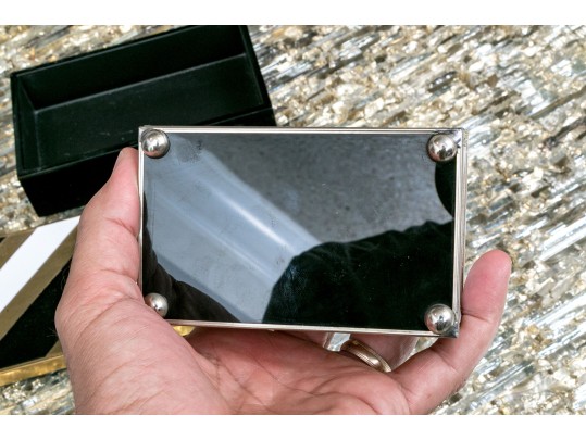 Two Decorative Table Top Items, Including A Striped Lidded Box, And Matchstrike 