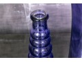Decorative Collection Of Four Purple Hued Glass Vases