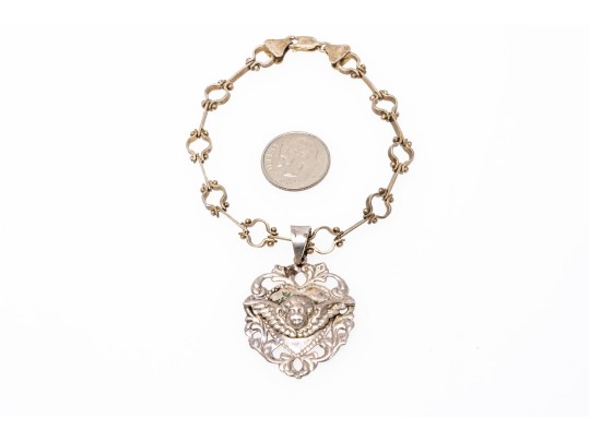 Sterling Silver Interesting Bar And Circle Bracelet With A Heart And Cherub Charm