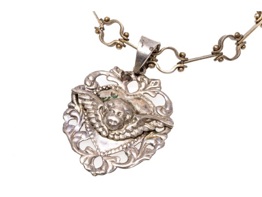 Sterling Silver Interesting Bar And Circle Bracelet With A Heart And Cherub Charm