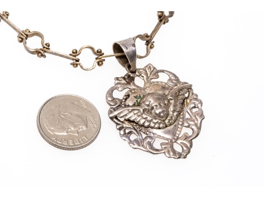Sterling Silver Interesting Bar And Circle Bracelet With A Heart And Cherub Charm