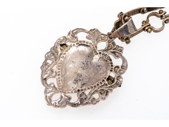 Sterling Silver Interesting Bar And Circle Bracelet With A Heart And Cherub Charm