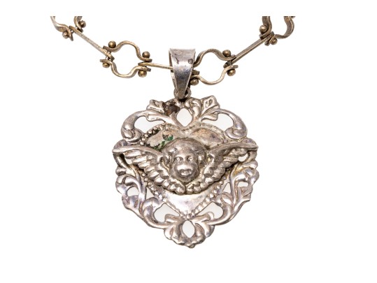 Sterling Silver Interesting Bar And Circle Bracelet With A Heart And Cherub Charm