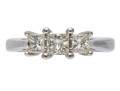 14K White Gold And Graduated Princess Cut Diamond Ring, Size 5.25