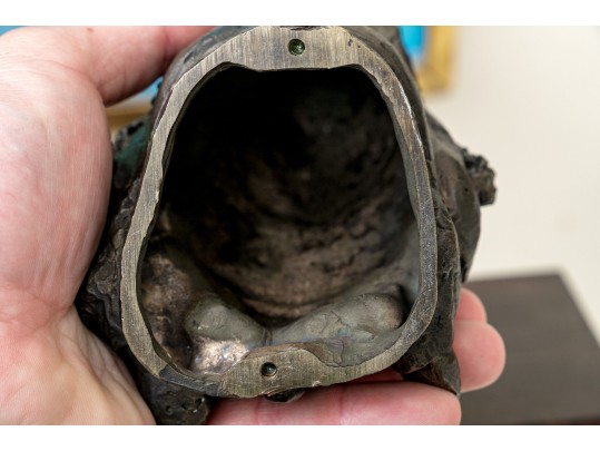 Bronze Sculpture Of A Man On A Wood Pedestal