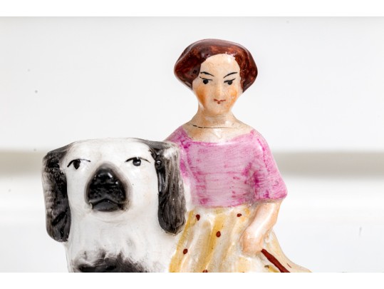 Pair Of English Hand-Painted Ceramic Figures Of Girls On Dogs