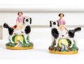 Pair Of English Hand-Painted Ceramic Figures Of Girls On Dogs