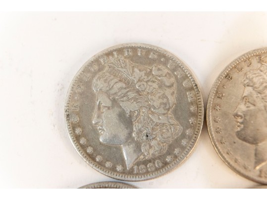 Fifteen Morgan Silver Dollars (1881 - 1901)