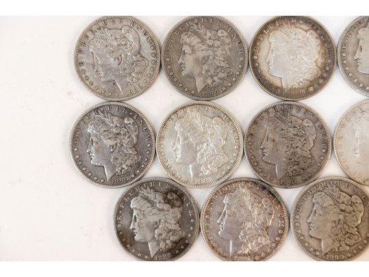 Fifteen Morgan Silver Dollars (1881 - 1901)