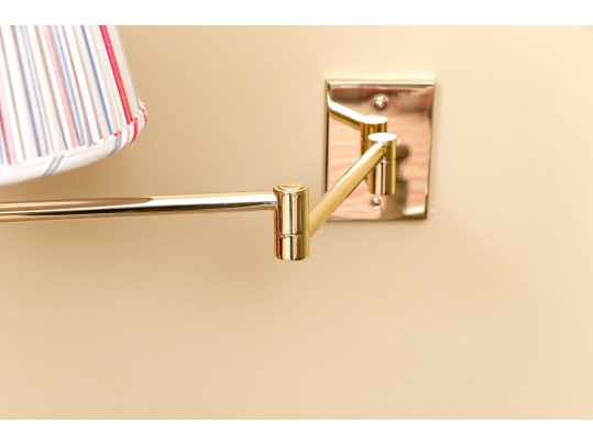 Pair Of Adjustable-Arm Brass Wall Sconces