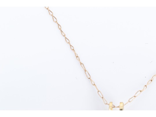 14k Yellow Gold Pretty Simple Emerald Knot Pendant, 0.12 CTS, With Chain