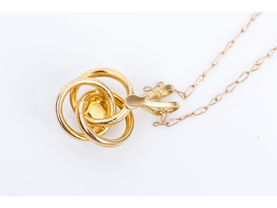 14k Yellow Gold Pretty Simple Emerald Knot Pendant, 0.12 CTS, With Chain