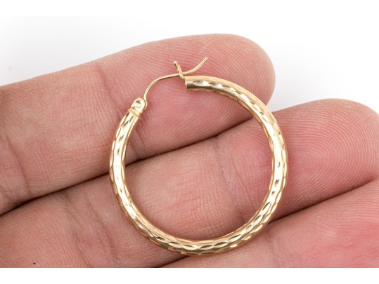 14k Yellow Gold Striking Diamond Cut Round Hoop Earrings