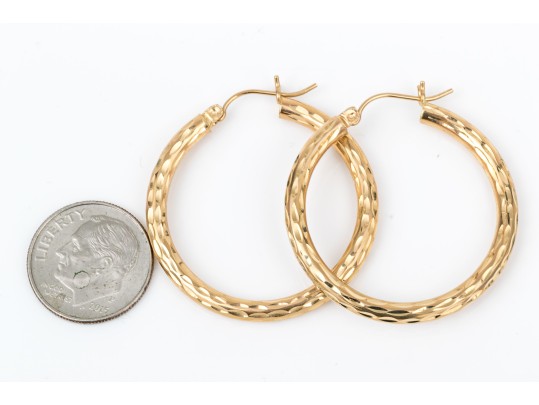 14k Yellow Gold Striking Diamond Cut Round Hoop Earrings