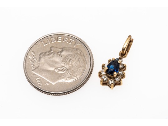 Slight 14K Sapphire And Diamond Pendant