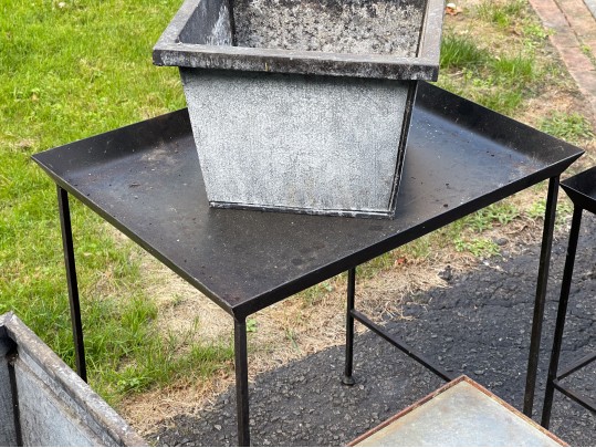 Assorted Collection Of Minimalistic Tables And Planters