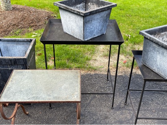 Assorted Collection Of Minimalistic Tables And Planters