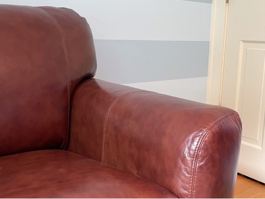 Luxurious Leather Upholstered Club Chair With Ottoman