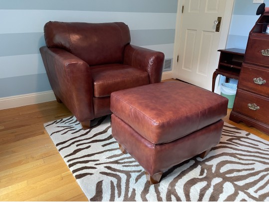 Luxurious Leather Upholstered Club Chair With Ottoman