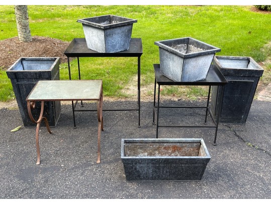 Assorted Collection Of Minimalistic Tables And Planters