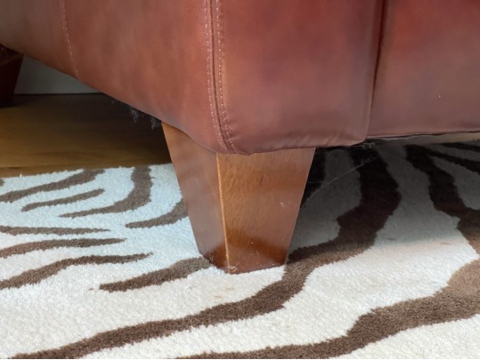 Luxurious Leather Upholstered Club Chair With Ottoman