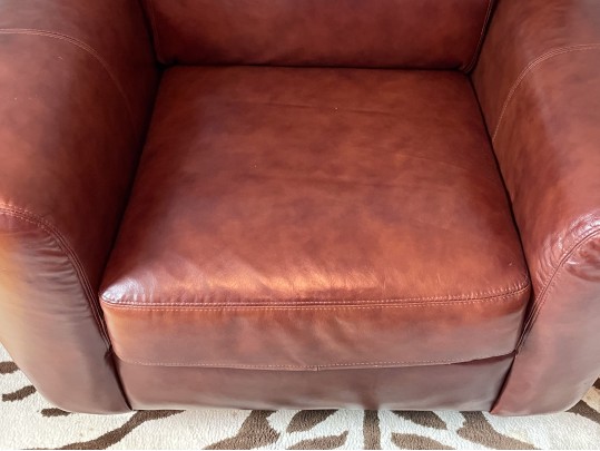 Luxurious Leather Upholstered Club Chair With Ottoman