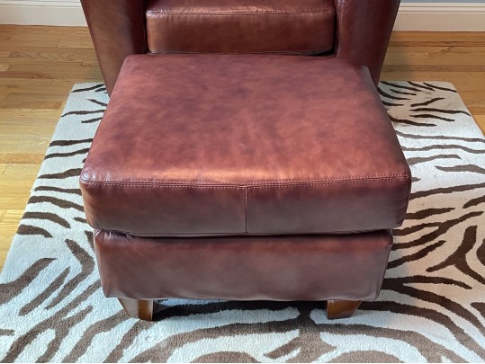 Luxurious Leather Upholstered Club Chair With Ottoman