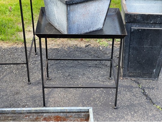 Assorted Collection Of Minimalistic Tables And Planters